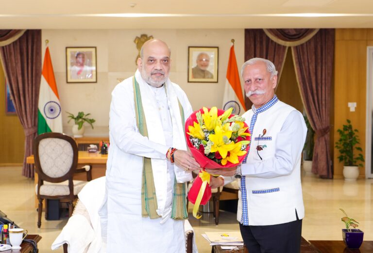Guv discusses security, cooperative initiatives with Amit Shah